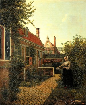 Woman with basket of beans in the kitchen garden